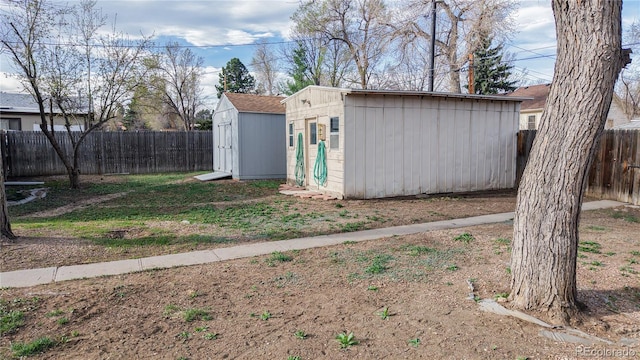 view of shed with a fenced backyard