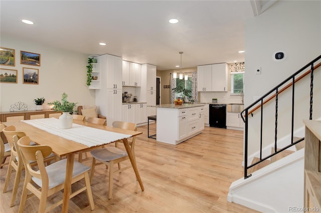 10527 Pierson Cir, Westminster, CO 80021 - dining space featuring recessed lighting, stairway, and light wood-style flooring