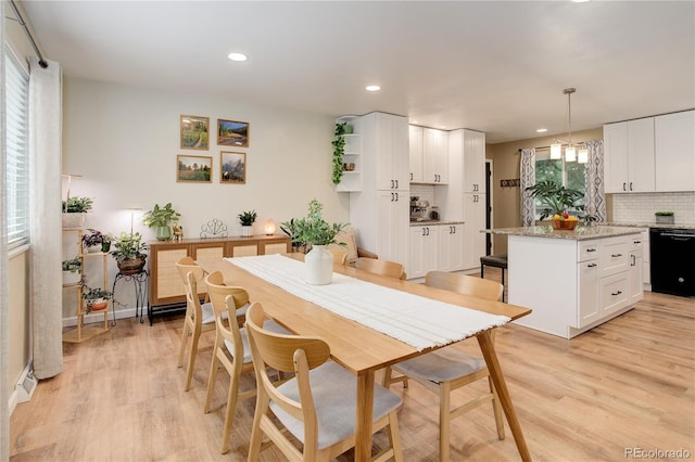 10527 Pierson Cir, Westminster, CO 80021 - dining room with light wood-style flooring and recessed lighting