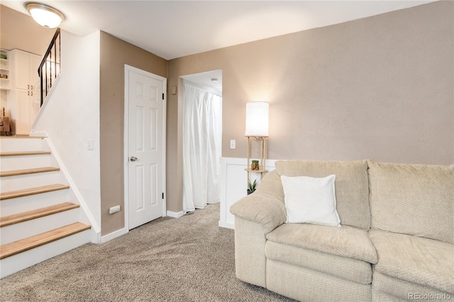 10527 Pierson Cir, Westminster, CO 80021 - living area featuring carpet flooring, stairway, and baseboards