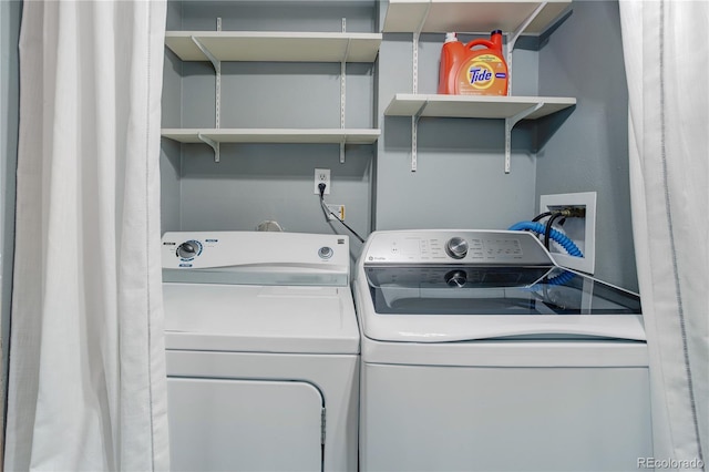 10527 Pierson Cir, Westminster, CO 80021 - washroom with washing machine and dryer