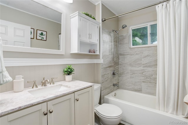 10527 Pierson Cir, Westminster, CO 80021 - bathroom with shower / tub combo, toilet, vanity, wainscoting, and crown molding