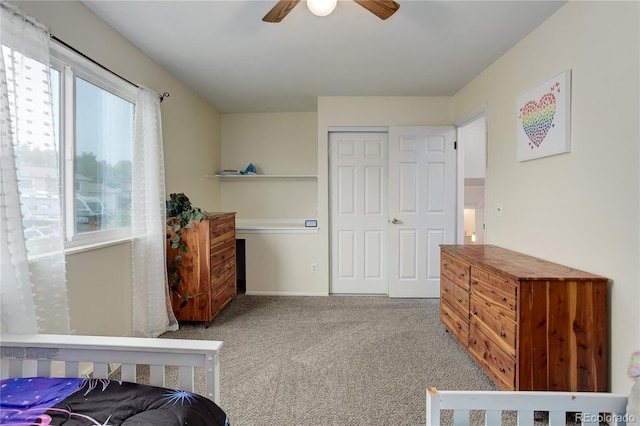 10527 Pierson Cir, Westminster, CO 80021 - carpeted bedroom with a closet, baseboards, and ceiling fan