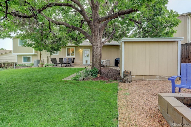 10527 Pierson Cir, Westminster, CO 80021 - view of yard featuring cooling unit and a patio