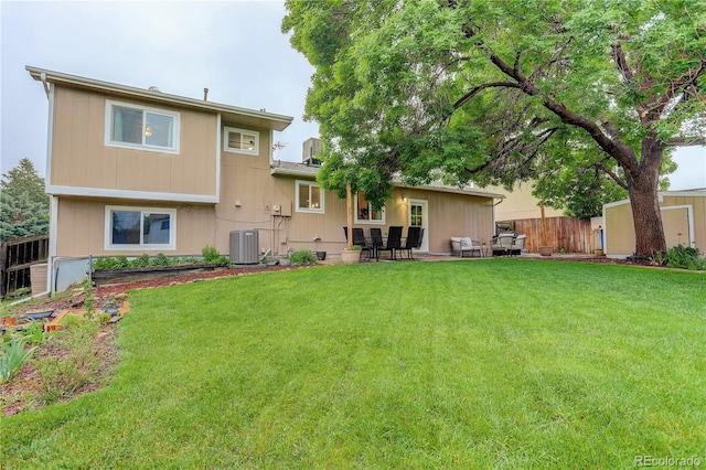 10527 Pierson Cir, Westminster, CO 80021 - rear view of property featuring cooling unit and a patio
