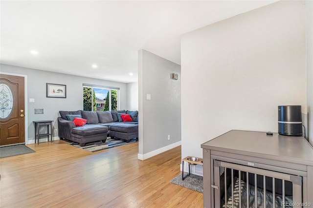 9580 W 51st Ave, Arvada, CO 80002 - living area with light wood-style floors and recessed lighting