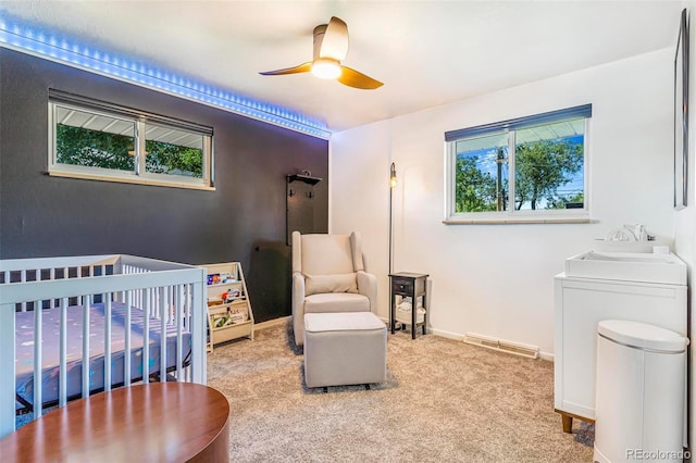 9580 W 51st Ave, Arvada, CO 80002 - bedroom with a crib, carpet floors, and ceiling fan