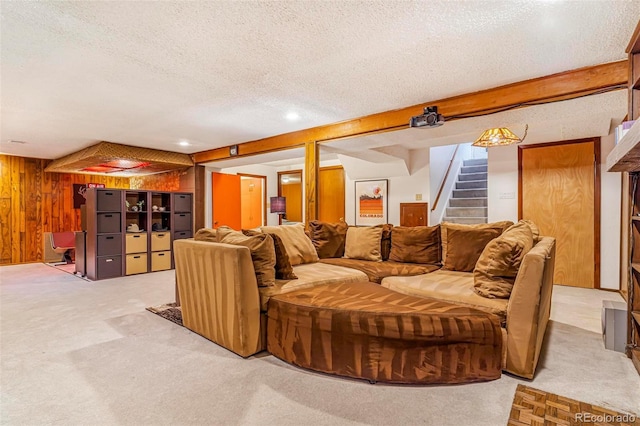9580 W 51st Ave, Arvada, CO 80002 - carpeted living room featuring a textured ceiling, stairs, and wood walls