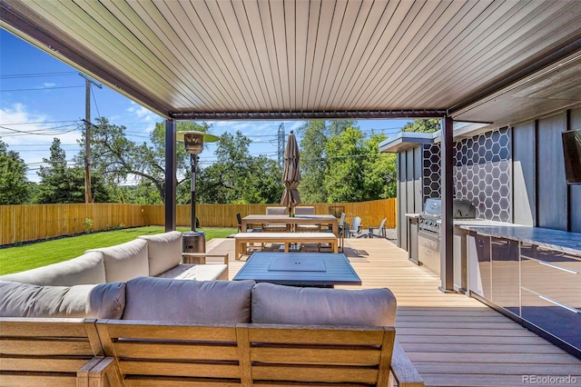 9580 W 51st Ave, Arvada, CO 80002 - wooden terrace with outdoor lounge area, outdoor dining area, a fenced backyard, and grilling area