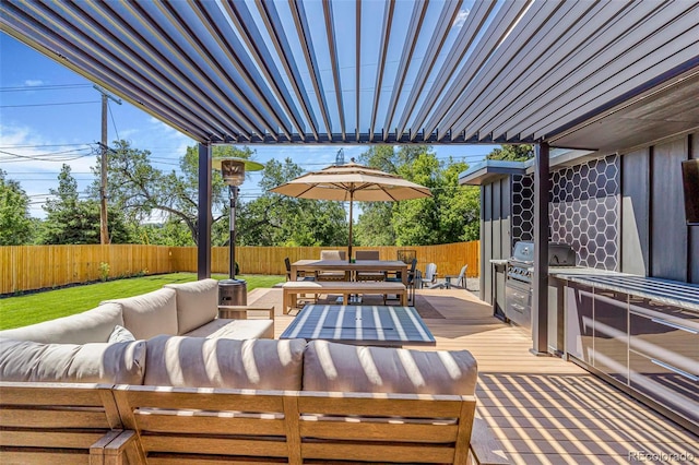 9580 W 51st Ave, Arvada, CO 80002 - fenced backyard with an outdoor hangout area, outdoor dining area, area for grilling, and a deck