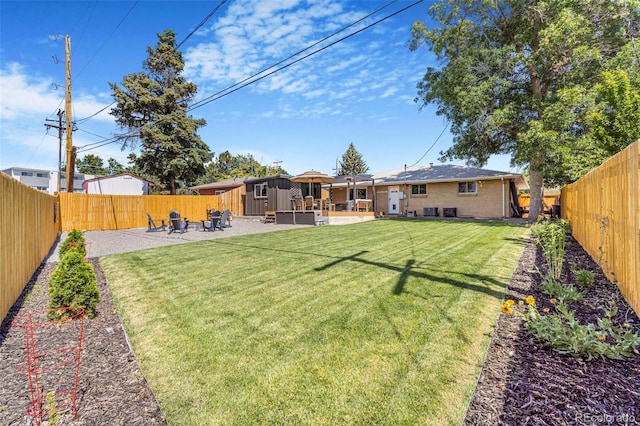 9580 W 51st Ave, Arvada, CO 80002 - fenced backyard featuring a patio