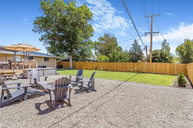 9580 W 51st Ave, Arvada, CO 80002 - fenced backyard with a patio and a fire pit