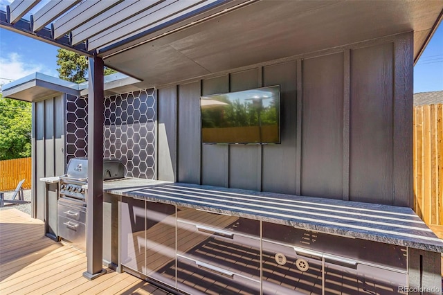 9580 W 51st Ave, Arvada, CO 80002 - wooden terrace featuring exterior kitchen