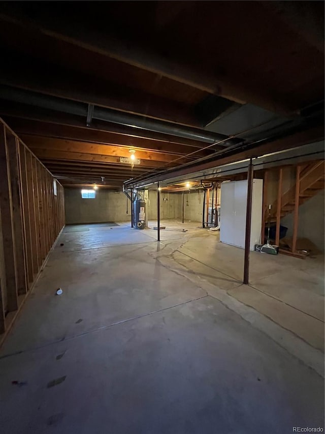 basement featuring water heater