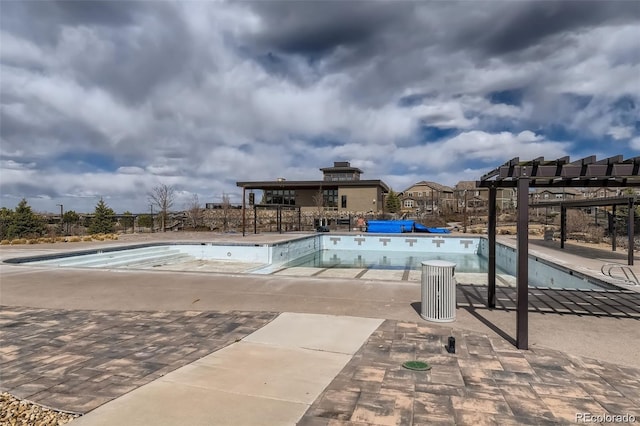 view of pool featuring a patio