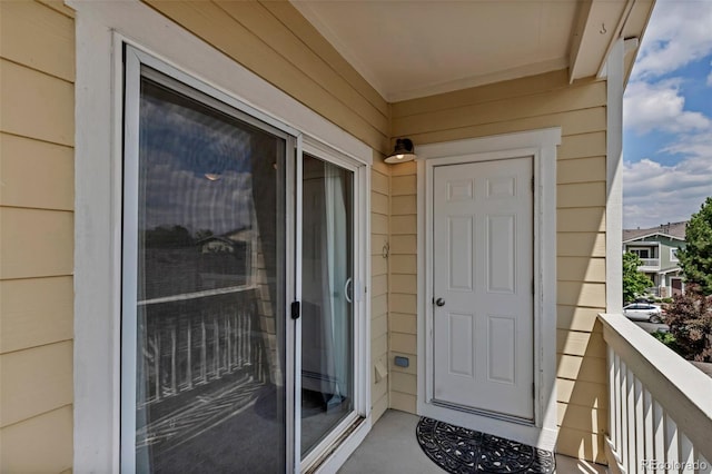 9387 Ashbury Cir Unit 203, Parker, CO 80134 - view of exterior entry featuring a balcony