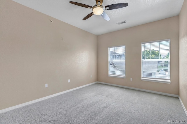 9387 Ashbury Cir Unit 203, Parker, CO 80134 - empty room with light carpet and ceiling fan