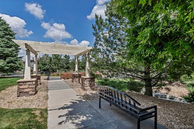 9387 Ashbury Cir Unit 203, Parker, CO 80134 - view of property's community with a pergola and a patio area