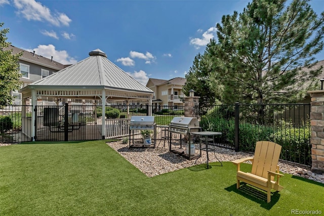 9387 Ashbury Cir Unit 203, Parker, CO 80134 - view of yard with a gazebo