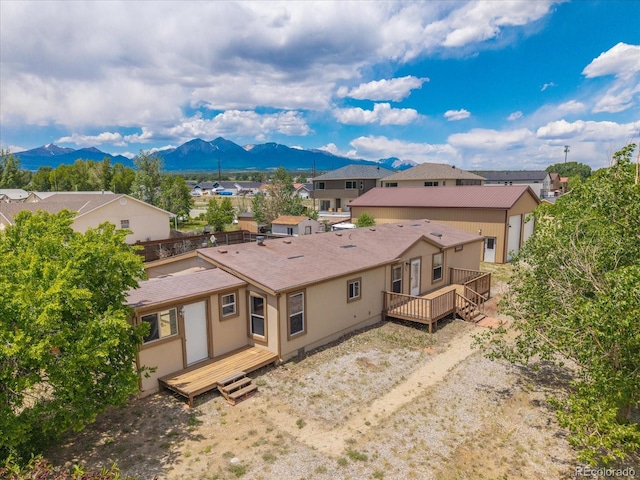 110 Evans Ave, Poncha Springs, CO 81242 - back of property with a deck with mountain view and a residential view