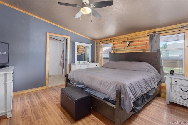 110 Evans Ave, Poncha Springs, CO 81242 - bedroom featuring lofted ceiling, light wood-type flooring, ceiling fan, and a textured ceiling