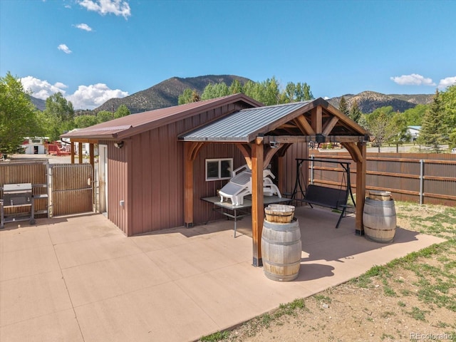 110 Evans Ave, Poncha Springs, CO 81242 - view of patio with a mountain view and a gate