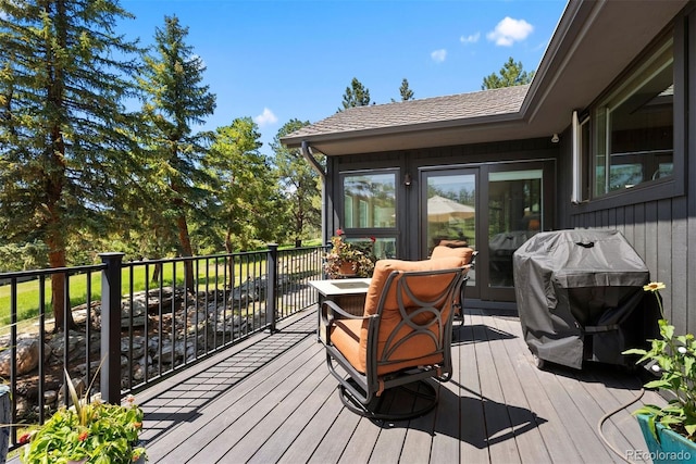 1555 Genesee Ridge Rd, Golden, CO 80401 - wooden terrace with a grill