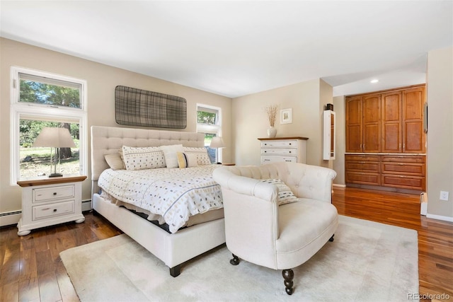 1555 Genesee Ridge Rd, Golden, CO 80401 - bedroom with dark wood-type flooring, recessed lighting, and baseboard heating