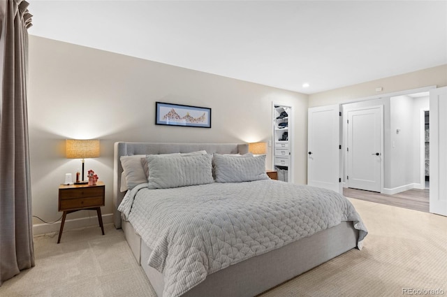 9939 E Aberdeen Ave, Englewood, CO 80111 - bedroom with light carpet, baseboards, and recessed lighting
