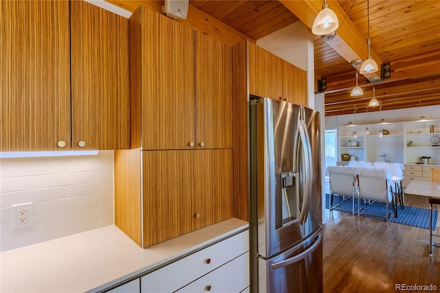 kitchen with wooden ceiling, beamed ceiling, stainless steel refrigerator with ice dispenser, decorative light fixtures, and dark wood-type flooring