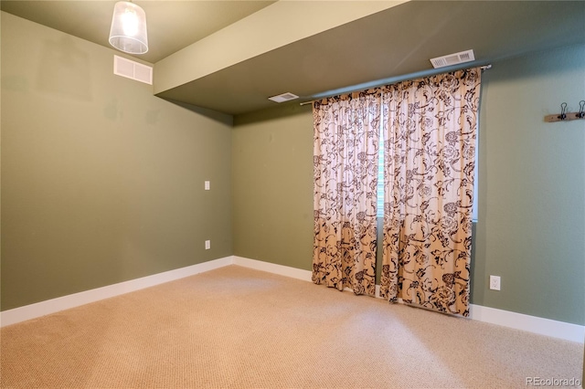 spare room with carpet floors