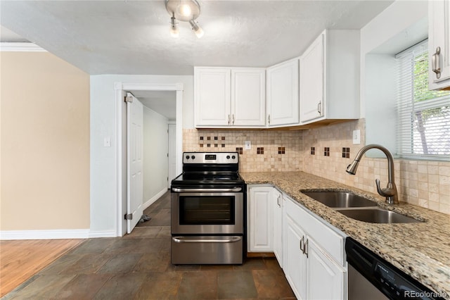 kitchen with white cabinetry, sink, stainless steel appliances, and light stone counters