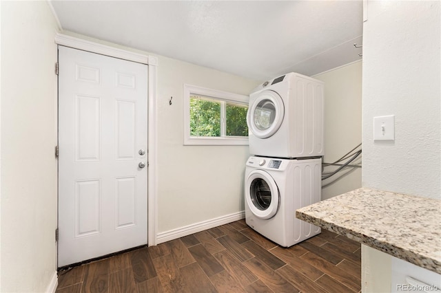 washroom with stacked washer / drying machine