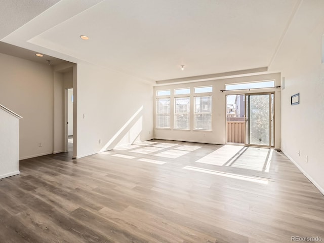 unfurnished living room with light hardwood / wood-style floors