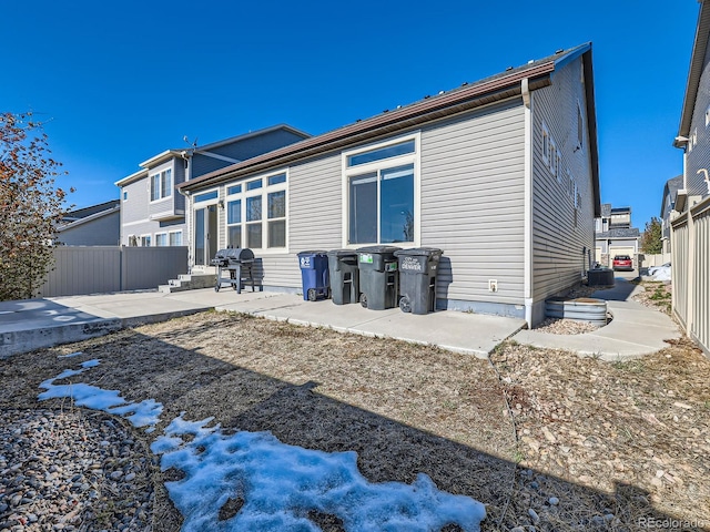 back of property with a patio area