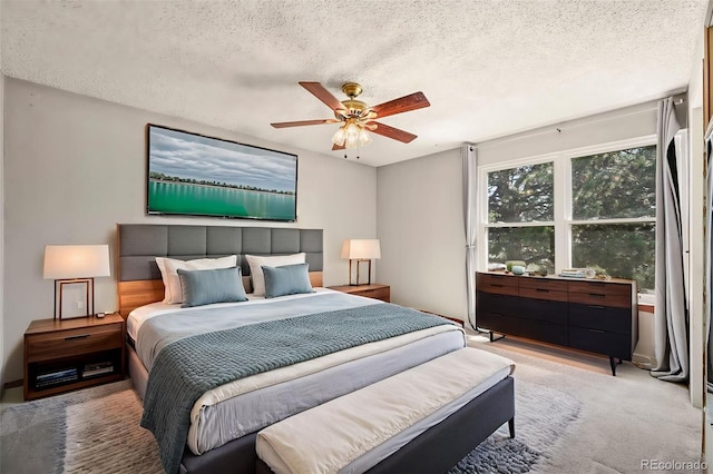 8679 Apache Plume Dr, Parker, CO 80134 - carpeted bedroom with a textured ceiling and ceiling fan