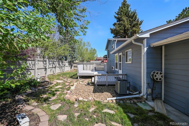 8679 Apache Plume Dr, Parker, CO 80134 - view of yard with a wooden deck and cooling unit