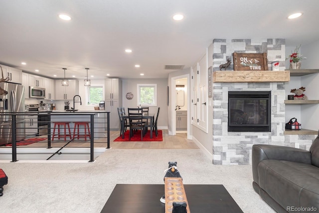 675 Gcr 462, Grand Lake, CO 80447 - living area with recessed lighting, baseboards, and a stone fireplace