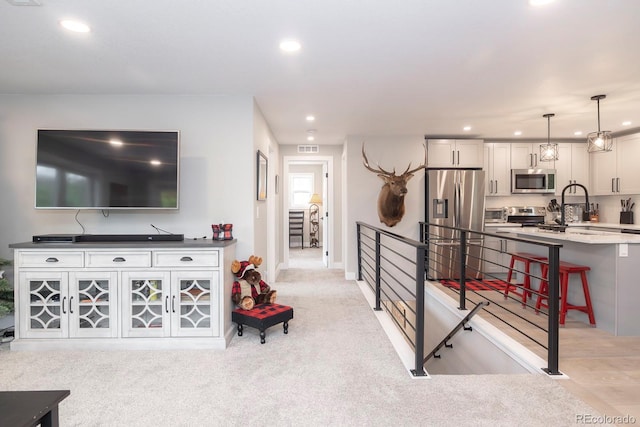 675 Gcr 462, Grand Lake, CO 80447 - living area featuring recessed lighting, light carpet, and baseboards
