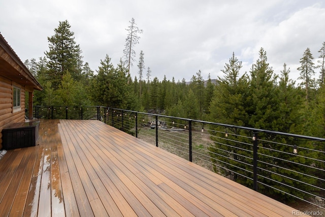 675 Gcr 462, Grand Lake, CO 80447 - wooden terrace with a forest view