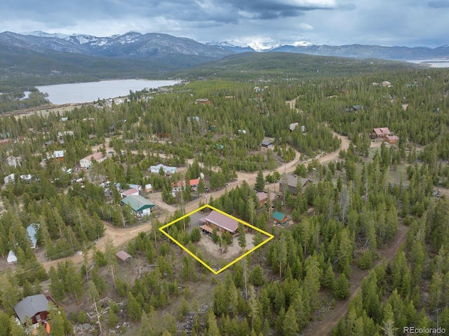 675 Gcr 462, Grand Lake, CO 80447 - aerial overview of property's location featuring property parcel outlined, a water and mountain view, and a forest