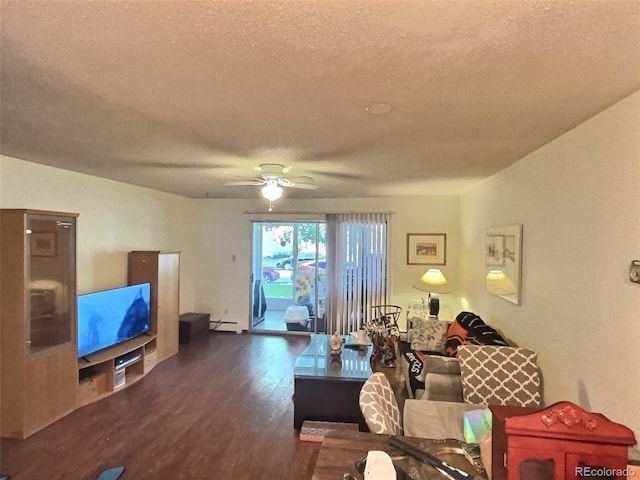 living room featuring dark hardwood / wood-style floors, a textured ceiling, ceiling fan, and baseboard heating