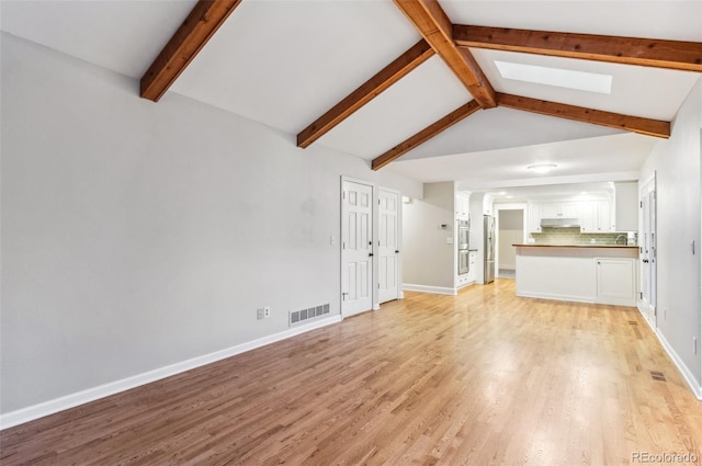 8132 Lodgepole Trl, Lone Tree, CO 80124 - unfurnished living room featuring baseboards, lofted ceiling with skylight, light wood-style flooring, and visible vents