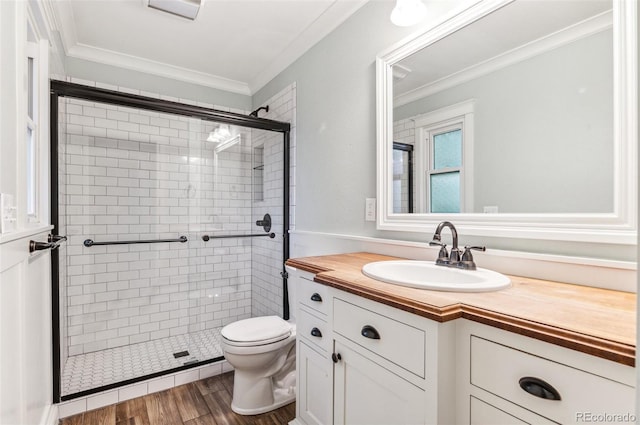 8132 Lodgepole Trl, Lone Tree, CO 80124 - full bathroom with crown molding, toilet, vanity, and a stall shower