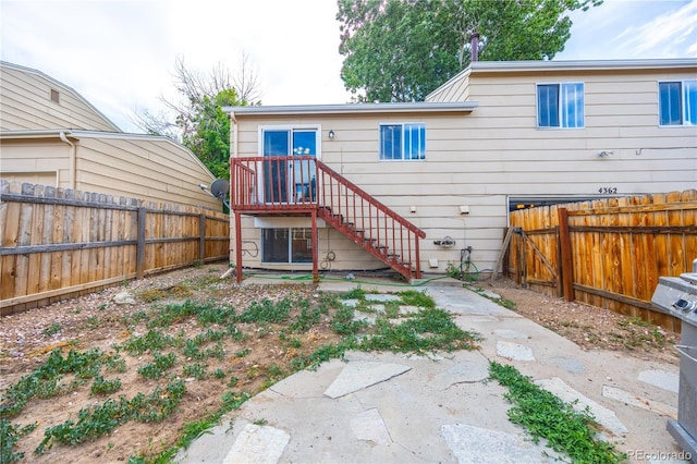 4362 Nepal St, Denver, CO 80249 - back of house featuring a fenced backyard