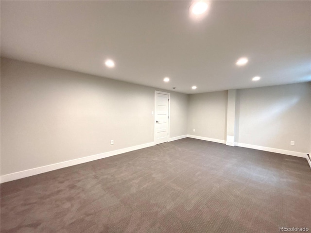 finished basement with recessed lighting, baseboards, and dark colored carpet