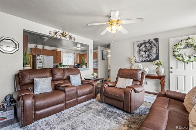 12167 E Exposition Ave, Aurora, CO 80012 - living area with a ceiling fan