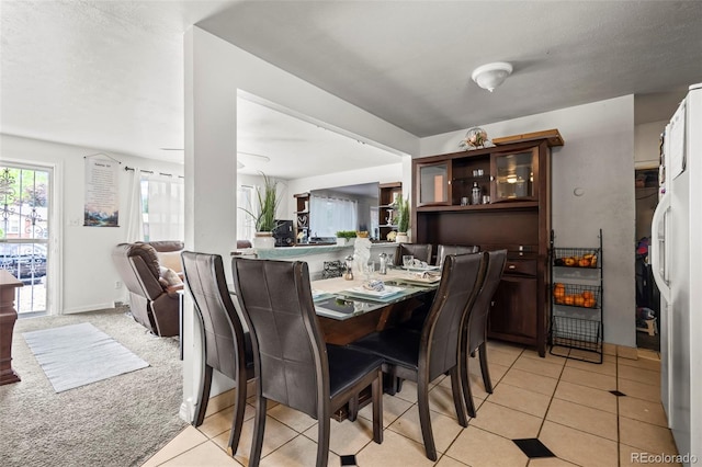 12167 E Exposition Ave, Aurora, CO 80012 - dining room with light tile patterned flooring