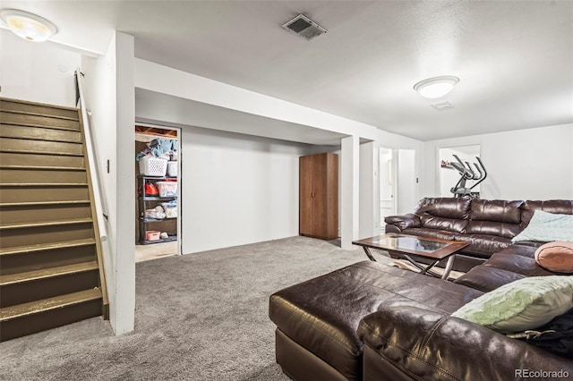 12167 E Exposition Ave, Aurora, CO 80012 - living area with carpet flooring and stairway
