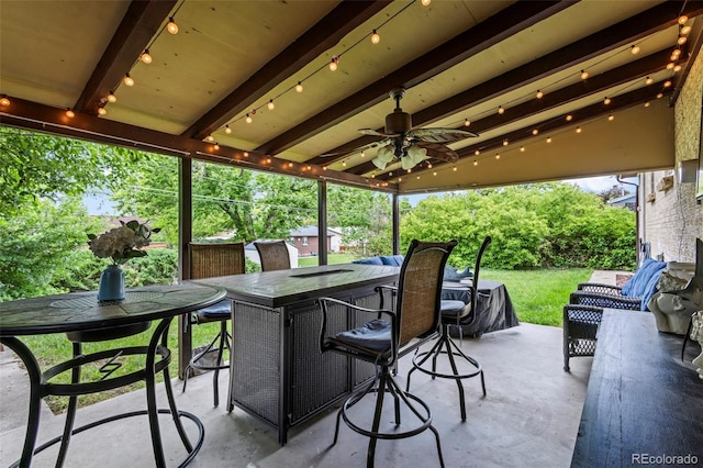 12167 E Exposition Ave, Aurora, CO 80012 - view of patio featuring ceiling fan
